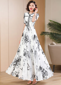 Side profile of a chic black and white ink-wash floral gown for weddings and cocktail parties, Vivian Seven designer apparel.