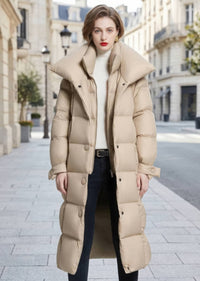 Front view of woman wearing open beige double collar longline down puffer coat