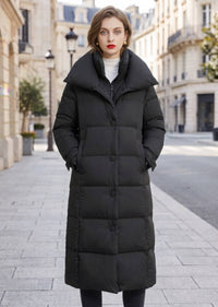 Front portrait view of woman wearing black double collar quilted longline down coat