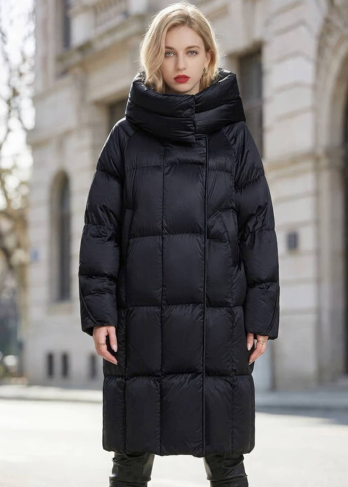 Full length front view of woman wearing black high neck quilted duck down long coat