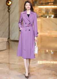 Side-angle view of the Vivian Seven purple long trench coat showing the flowy silhouette and mid-calf length.