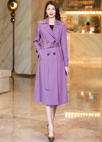 Detailed view of a Vivian Seven purple double-breasted trench coat highlighting the structured shoulders and sleeve straps.