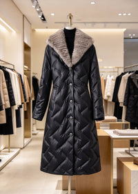 Black quilted genuine sheepskin leather long down coat with mink fur shawl collar on mannequin in boutique rack
