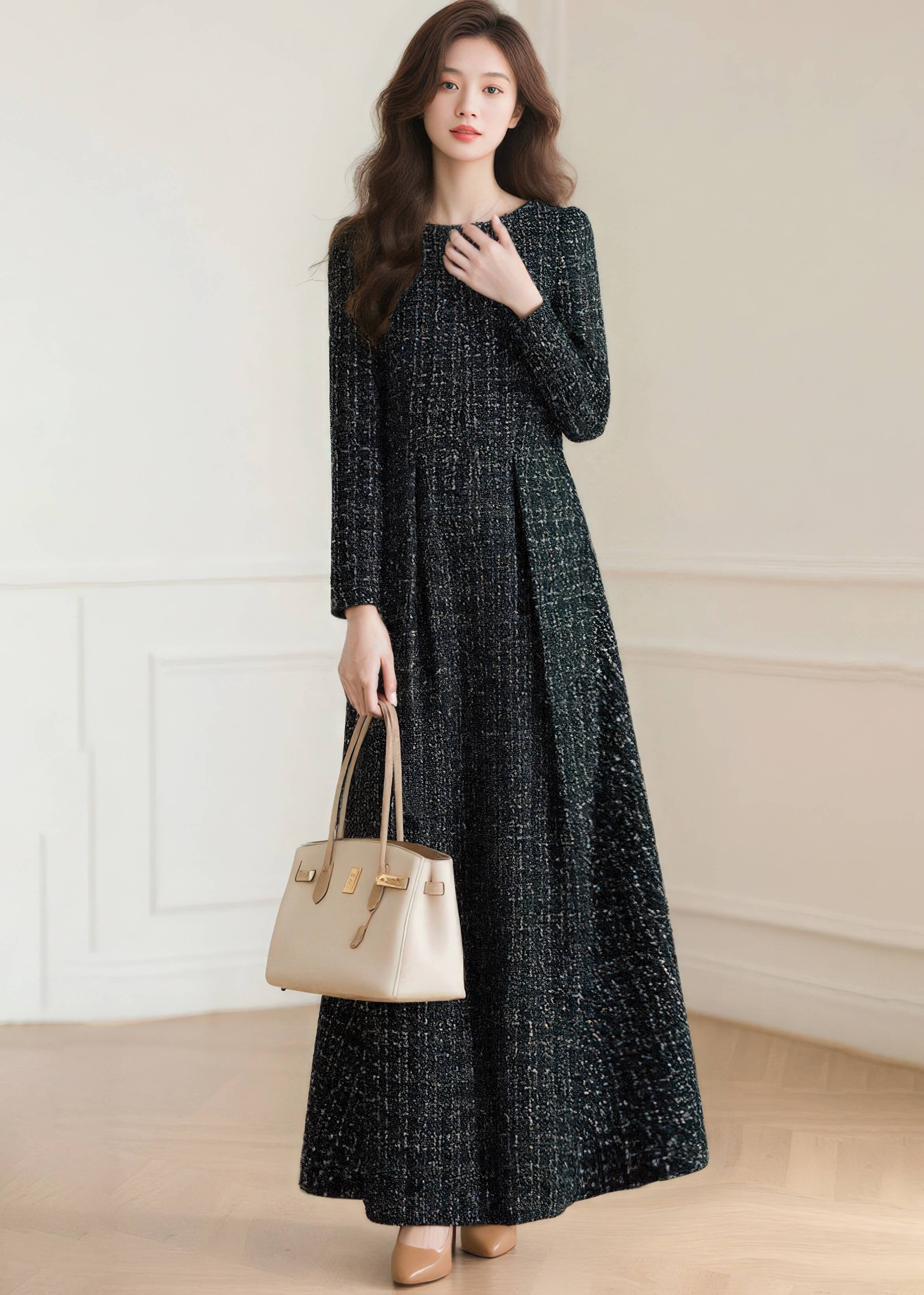 Front view of the Vivian Seven black long sleeve tweed maxi dress with a defined waistline and textured plaid finish.