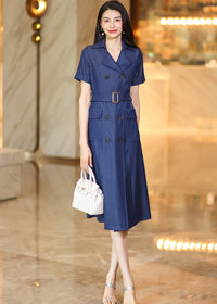 A front-facing promotional photo of the denim midi dress, emphasizing its A-line silhouette and elegant dark blue wash.