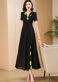 Standing Pose,Sophisticated black maxi dress for women featuring a wrap-style V-neckline and vibrant yellow-green floral accents.