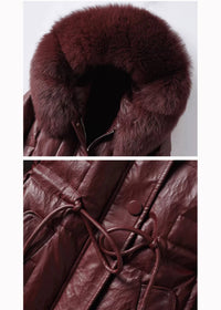 Close-up detail shot of burgundy genuine leather coat showing plush fur collar and knotted waist drawstring
