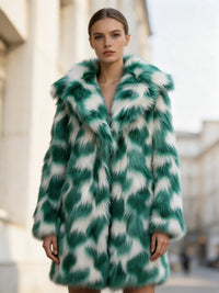 Front view of a model showcasing a luxurious women's emerald green and white patterned faux fur coat.