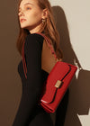 red baguette handbag