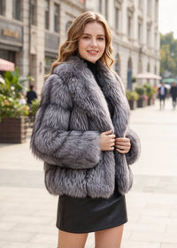 Three-quarter close-up view highlighting the shawl collar and frosted fur texture of the cropped jacket.  