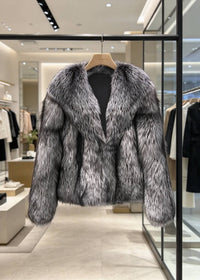 Boutique hanger display of the women's frosted silver fox faux fur crop jacket with shawl collar.  