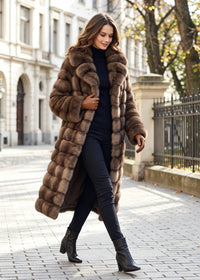 Side profile walking street look of a woman styling a warm brown tiered wing collar faux fur overcoat with black slim pants