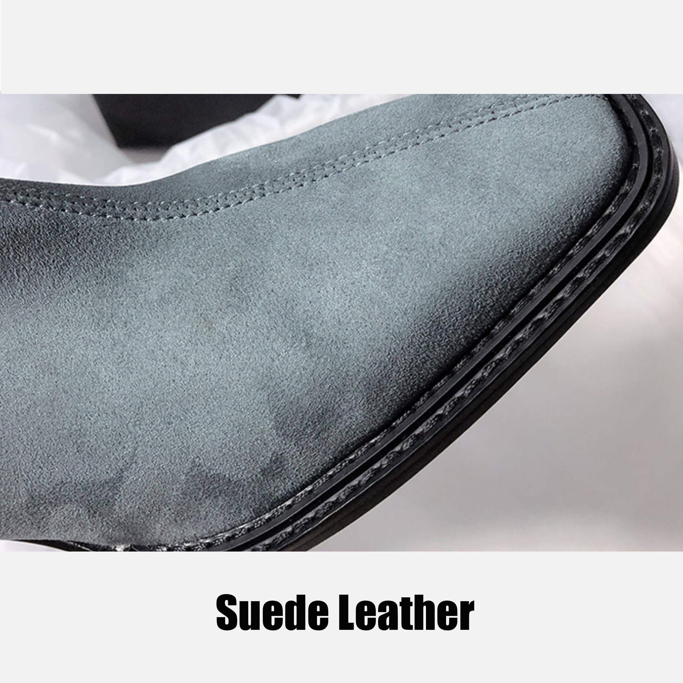 A close-up detail shot of the boot's toe area, highlighting the texture of the "Suede Leather" and the visible stitching along the sole.
