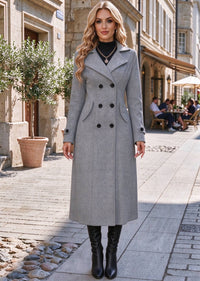 Full length front view of woman wearing grey classic double-breasted long overcoat with flap pockets