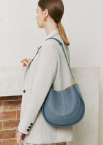 blue leather handbag