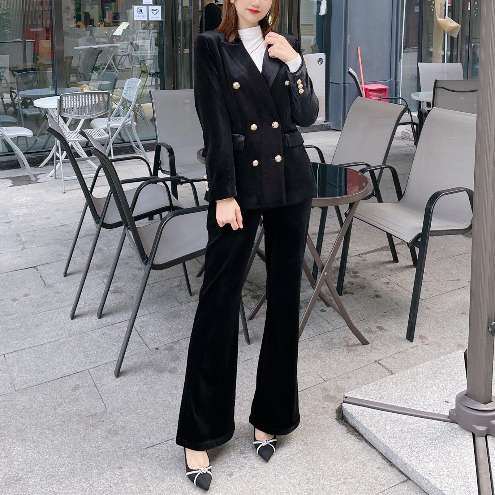Who made Dakota Johnson's black velvet pants, cap toe silver pumps, and  blazer? – OutfitID
