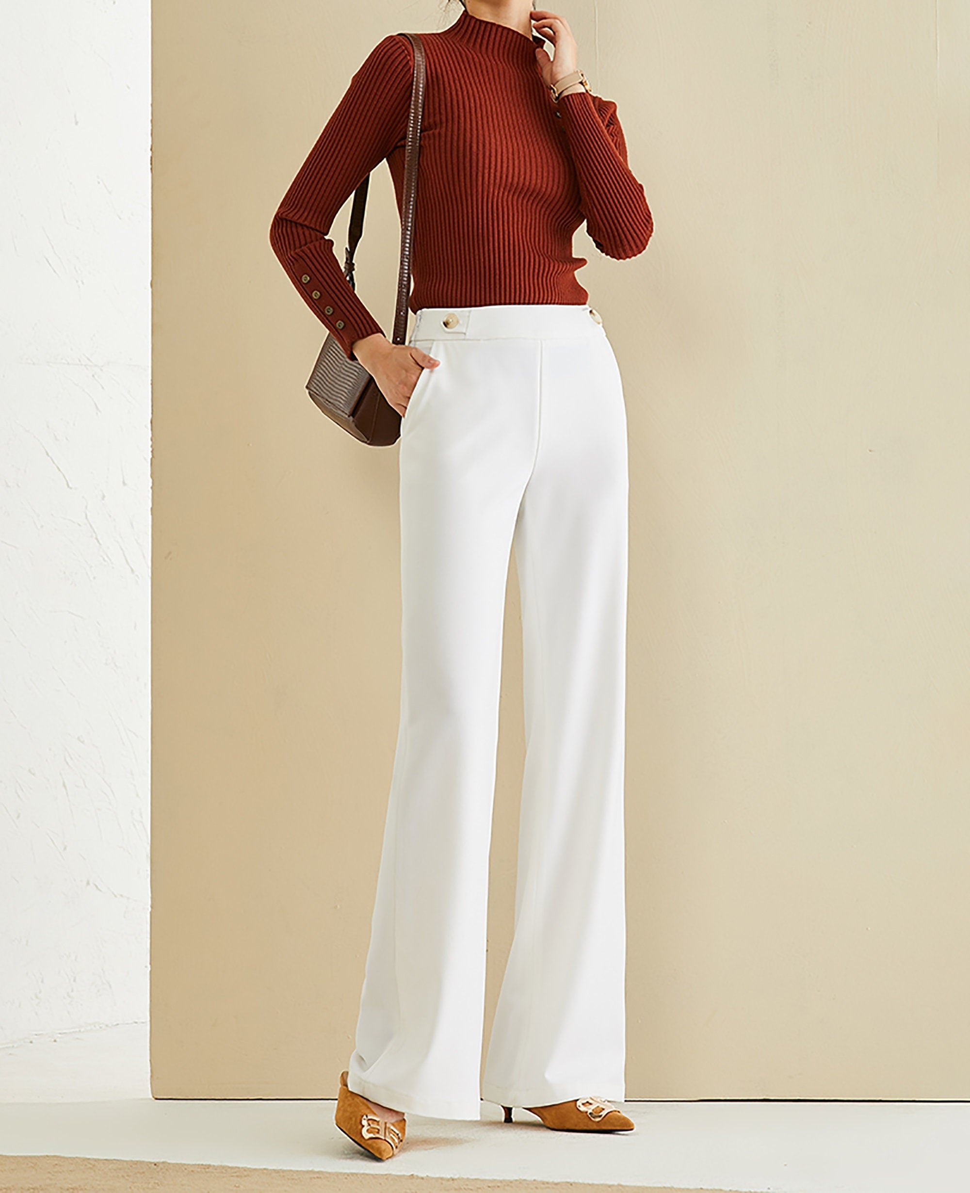 high low side slit pinstripe sweater and flowy winter white wide leg  trousers